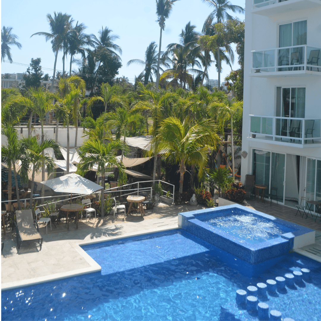 Alberca con cascada en Gran Palma Hotel Boutique, Acapulco Diamante